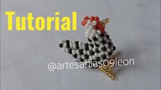 an image of a chicken made out of beads