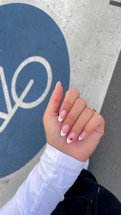 French Acrylic Nails With Heart, French With A Heart Nails, White Tips With Hearts Nails, Nails Design For Valentines Day, French Tip Almond With Heart, Almond Nails White Heart, Cute Valentines Nails French Tip, Nail Inspo Almond Heart, French Almond Nails With Heart