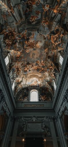 an ornate ceiling with paintings on it