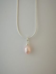 Lovely simple pink freshwater pearl pendant on 18 inch snake chain. Baroque white freshwater pearl on snake chain. Perfect gift. Handmade. Chain is silver plated, nickel free and hypoallergenic. Freshwater pearl necklace. Single pearl necklace. Please request smaller chain if needed. Pearl Necklace Pink, Single Pearl Necklace, Pink Pearl Necklace, Single Pearl, Handmade Chain, Baroque Pearl Necklace, Pearl And Lace, Freshwater Pearl Necklace, Pearl Hoop Earrings