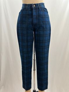 These 80s deadstock Chic denim are one of my faves! In a dark blue, they have a plaid design, a tapered leg and a high waist. Keep it simple with a white tee or add a striped one for a pattern on pattern look. -Vintage 80s -High waist, plaid design -Machine wash recommended  Measurements:  *Waist 12 inches *Hips 17 1/2 inches *Inseam 26 1/2  inches *Length 37  inches *This item is pre-loved and there may be minor flaws to the garment. Not to worry if there is anything major we will let you know. --Please read shop policies thoroughly relating to sizing, returns will not be accepted. I encourage you to ask questions for additional pictures, measurements, etc.-- Dark Blue Plaid, 80s Women, 80s Denim, Tapered Leg Jeans, Denim Chic, Plaid Pants, Plaid Design, Historical Clothing, White Tee