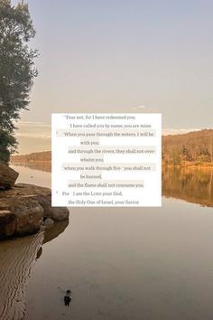 an image of a lake with a poem written on the water and trees in the background