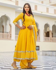 Dress Set Anarkali Style - Shaili - www.riafashions.com Yellow Anarkali Cotton Silk Kurta, Yellow Mulmul Palazzo Set With Zari Work, Yellow Anarkali Churidar In Cotton Silk, Yellow Cotton Silk Anarkali Set With Cutdana, Yellow Mulmul Sharara With Traditional Drape, Traditional Cotton Lawn Suit With Gota Work, Yellow Mulmul Palazzo Set With Cutdana, Yellow Mulmul Palazzo Set With Cutdana Details, Diwali Anarkali Set With Cutdana In Mulmul