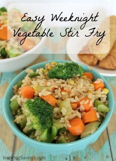 a bowl filled with rice and vegetables next to crackers