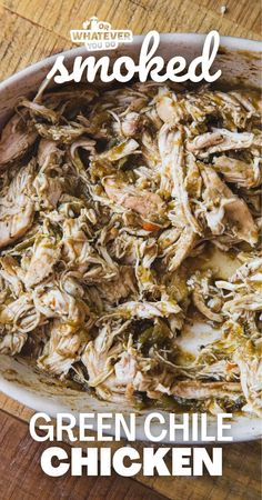 the cover of what we eat smoked green chile chicken is shown in a white bowl on a wooden table