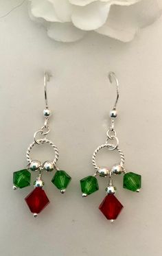 Christmas Holly Earrings comprising 925 Sterling Silver and Swarovski Crystals. 4.75cm drop. Very festive. Cheap Christmas Earrings With Round Beads, Cheap Cute Christmas Earrings, Handmade Christmas Jewelry Making Tools, How To Make Dangle Earrings Diy, Holiday Dangle Earrings With Ear Wire, Christmas Celebration Dangle Earrings, Holiday Dangle Jewelry With Matching Earrings, Holiday Jewelry With Matching Dangle Earrings, Holiday Green Drop Earrings