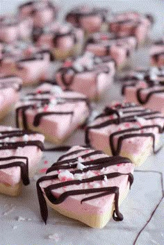 keto peppermint cheesecake bites with chocolate drizzled on top