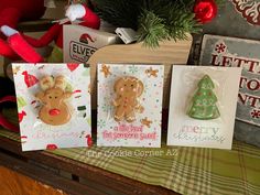 three christmas cards with gingerbreads on them