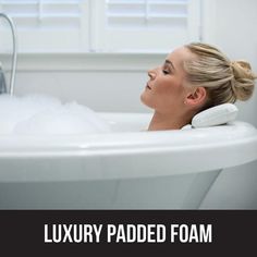 a woman in a bathtub with the words luxury padded foam