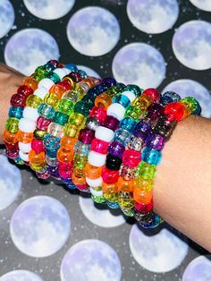 Set of 10 Glittery Rainbow Kandi Beaded Bracelets Add some color and sparkle to your look with these cute glittery bracelets  You'll receive 10 glittery Kandi beaded bracelets (pic is example only) We make our Kandi bracelets using stretch string. These bracelets are made in a variety of adult sizes. If you'd like them a specific size please send us a message and we'll be happy to make them for you We're here to make the sweetest kandi for you !! ☮️💙🍬 Kandi Bracelets Rave Delicious Hunnies, Rainbow Kandi, Kandi Inspiration, Rave Jewelry