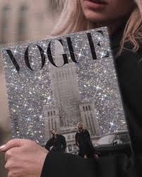 a woman holding up a book with the word vocif on it