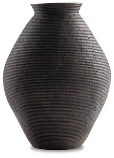 a black vase with holes in it on a white background