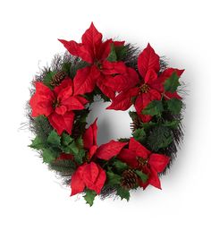 a christmas wreath with poinsettis and pine cones on white background, top view