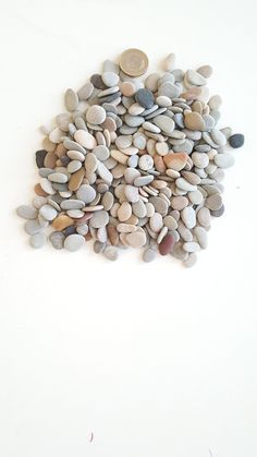 a pile of rocks sitting on top of a white table