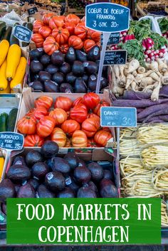 an open market with various fruits and vegetables on display for sale in the background text reads food markets in copenhagen