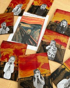 many pictures of people are shown on the table with them in front of an orange and red painting