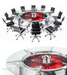 a glass table with chairs around it and an image of a red object in the middle