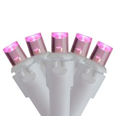 a bunch of pink lights that are on top of a white pole and in front of a white background