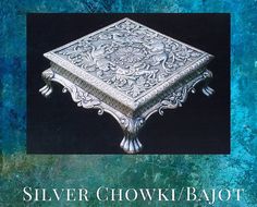 a book cover with an ornate silver box on it's side and the words, silver chowki - paot