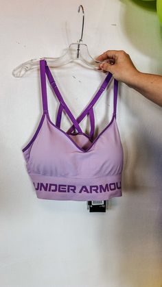 This bra gives you the right support for low-impact activities. It has a longer cut, seamless fit, and adjustable straps for complete comfort. Delivers strategic support, tailored for low-impact activities like yoga, pilates & hiking UA Seamless is a soft knit with engineered ventilation, mapped to the places you need it most Soft, removable cups for enhanced shape & coverage Skinny strap pullover with adjustable cross back design Wide jacquard wordmark band for amazing stretch & comfort Materia Long Sports Bra, Dress Mules, Rust Sweater, Rebecca Black, Black Rain Jacket, Hot Pink Leopard, Western Style Outfits, Nature Dress, Leopard Sweater