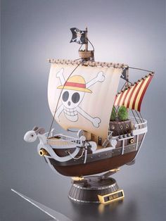 a toy pirate ship with a skull and crossbones