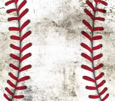 a baseball stitched to the side of a white and gray wall with red stitches