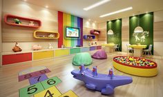 a child's playroom with colorful walls and flooring