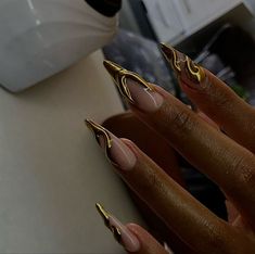 Gold French Tip Stiletto Nails, Egypt Inspired Nails, Gold Freestyle Nails, Steletoes Nails Classy, Gold Moon Nails, Black And Gold Nails Almond, Black Matte Nails With Gold, Egyptian Nails Designs