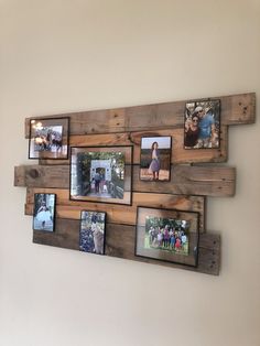 a wooden wall hanging with pictures on it