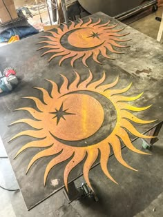 the sun and moon are painted on top of concretes in preparation to be finished