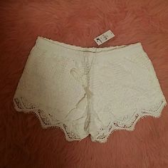 Brand New With Tag Express Lace Shorts I'm Ivory Color. Gorgeous Lace Details All Over With Tassels In The Front, Size Xs Fits Loss. Perfect For Beaches And Summer Days Or Under Ruffle Skirts. Retail $49.9 Shorts With Tassels, Womens Lace Shorts, Ruffle Skirts, Ivory Color, Women Lace, Summer Days, Lace Detail, Lace Shorts, Tassels