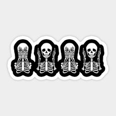 three skeleton stickers sitting next to each other