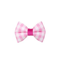 a pink and white bow tie on a white background