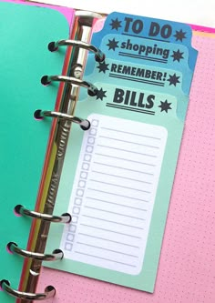 an open planner book with the words to do, shopping, and bill's on it