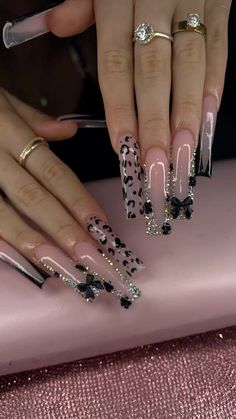 #nails #nailart #nailinspo #cheetah #acrylic #bows Leopard Nails Black And White, Black Nails Cheetah Print, Flared Nails Acrylics, Black Cheetah Nail Designs, Pink N Silver Nails, Black Nail Acrylic Designs, White And Cheetah Nails, Long Cheetah Print Nails