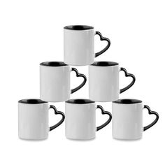 six black and white coffee mugs stacked in a pyramid