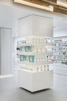 the inside of a pharmacy store with shelves full of medicine and other medical supplies on display