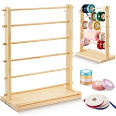 two wooden shelves with different types of thread spools and tape on each shelf