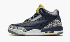 the nike air jordan 3 is in blue and white with an animal print pattern on the upper