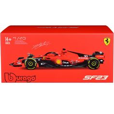 a red box with a ferrari racing car on it's front and side view