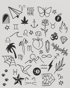 an image of various tattoos on a piece of paper with the words kiss here written in it