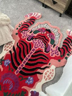 a colorful rug on the floor in a room