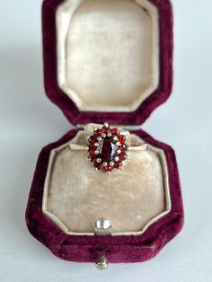 Vintage 9ct yellow gold garnet cluster ring The item comes without the box in the photos, but will be presented in a Gembank1973 gift box. Weight - 3g Ring Size - UK R Measurements - head of ring 12x11 Materials - 9ct gold Hallmarks - Rubbed away - please refer to images Condition - the overall condition is very good Office use - H2 Thanks for looking :) Red Rings Engagement, Heirloom Cluster Ring Gift, Cluster Ruby Ring In 14k Gold As Gift, Yellow Gold Garnet Cluster Ring As Gift, 14k Gold Cluster Ruby Ring For Gift, 14k Gold Cluster Ruby Ring As Gift, Gold Cluster Ruby Ring As Gift, Heirloom Ruby Cluster Ring As Gift, Heirloom Ruby Cluster Ring Gift