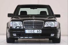 the front end of a black mercedes benz