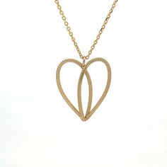 Gold guitar string heart on 10k gold chain on white background Adjustable Heart-shaped Alloy Chain Necklace, Chic Heart-shaped Adjustable Necklace, Heart-shaped Adjustable Cord Jewelry, Elegant Heart-shaped Necklace With Adjustable Cord, Gold-tone Heart Pendant Necklace With Adjustable Chain, Guitar String Jewelry, Eco Luxury, Acoustic Guitar Strings, Signature Necklace