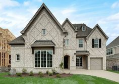 a large house is being built in the suburbs