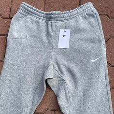 Grey Nike Joggers Nike Solo Swoosh Very Comfortable Rare Find Standard Fit / Tapered Leg Grey Nike Joggers, Joggers Nike, Clothing Art, Pants Nike, Wu Tang Clan, Nike Joggers, Cool Outfits For Men, Grey Joggers, Grey Nikes