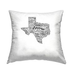 a white pillow with the word texas printed on it's front and back side