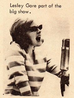 an old photo of a woman singing into a microphone with the caption lessley goree part of the big show