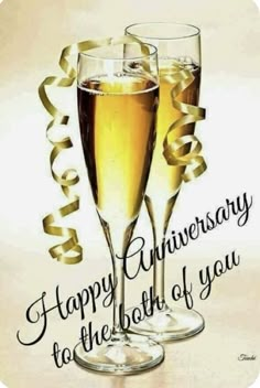 two glasses of champagne with the words happy anniversary to the both of you